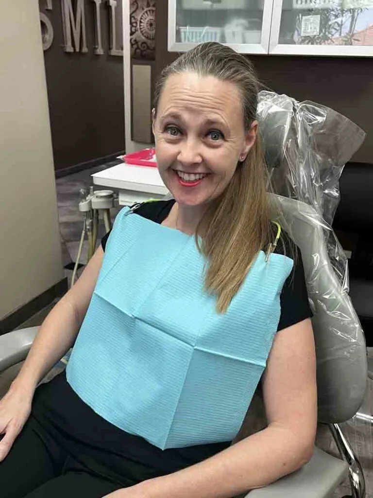 woman relieved after getting emergency dental treatment at Scottsdale Dental Arts