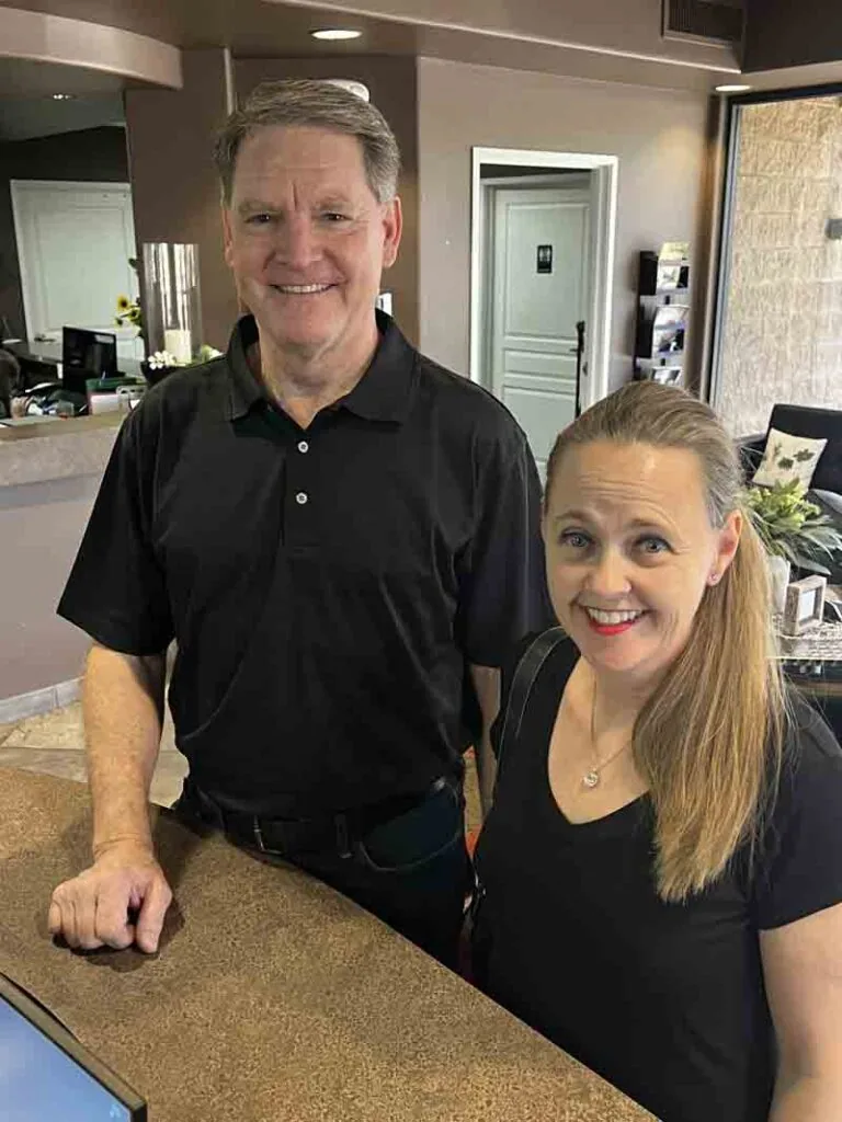 patients smiling after getting their teeth cleaned at Scottsdale Dental Arts